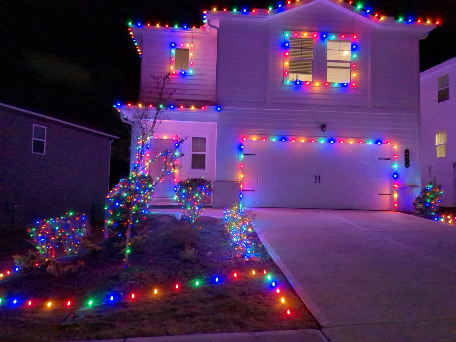 All out colorful Christmas light install in Flowery Branch, GA